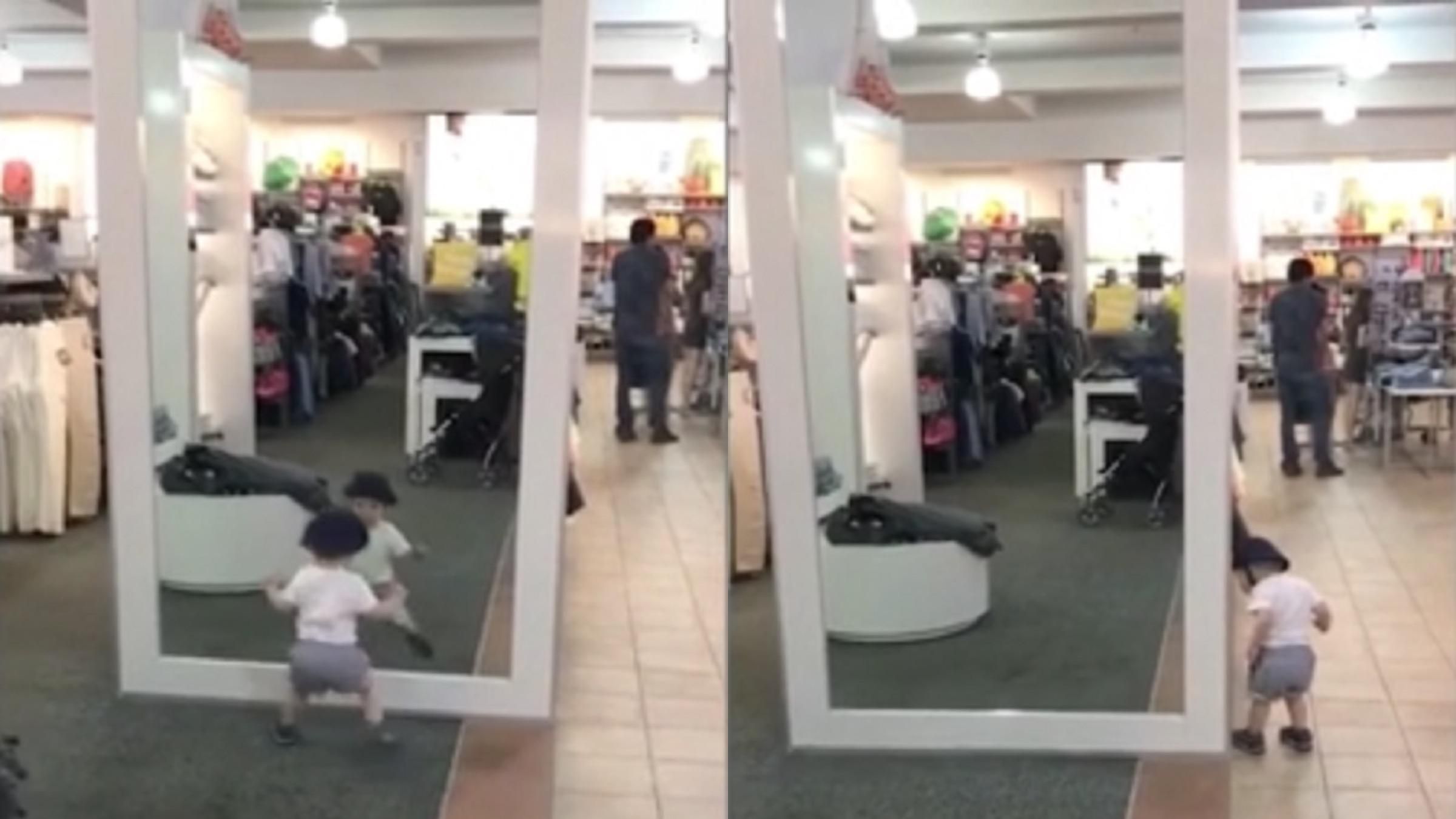 Малыш впервые увидел свое отражение в зеркале: курьезное видео Малыш впервые увидел свое отражение в зеркале: курьезное видео